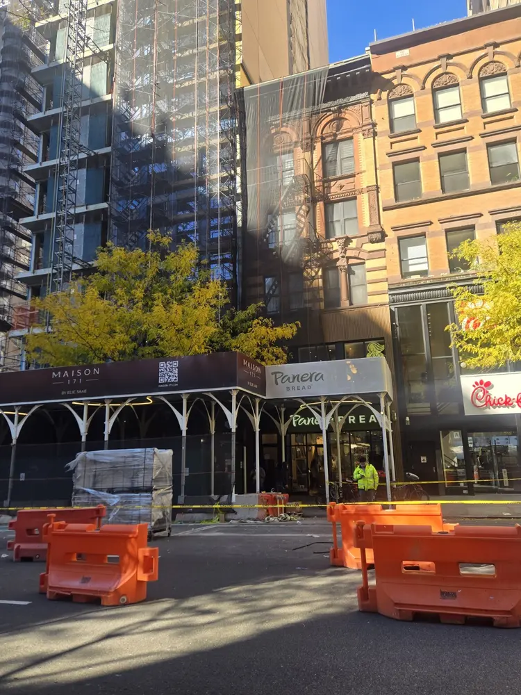 Street-level restaurant pickup location photographed during Bryan’s catering delivery work